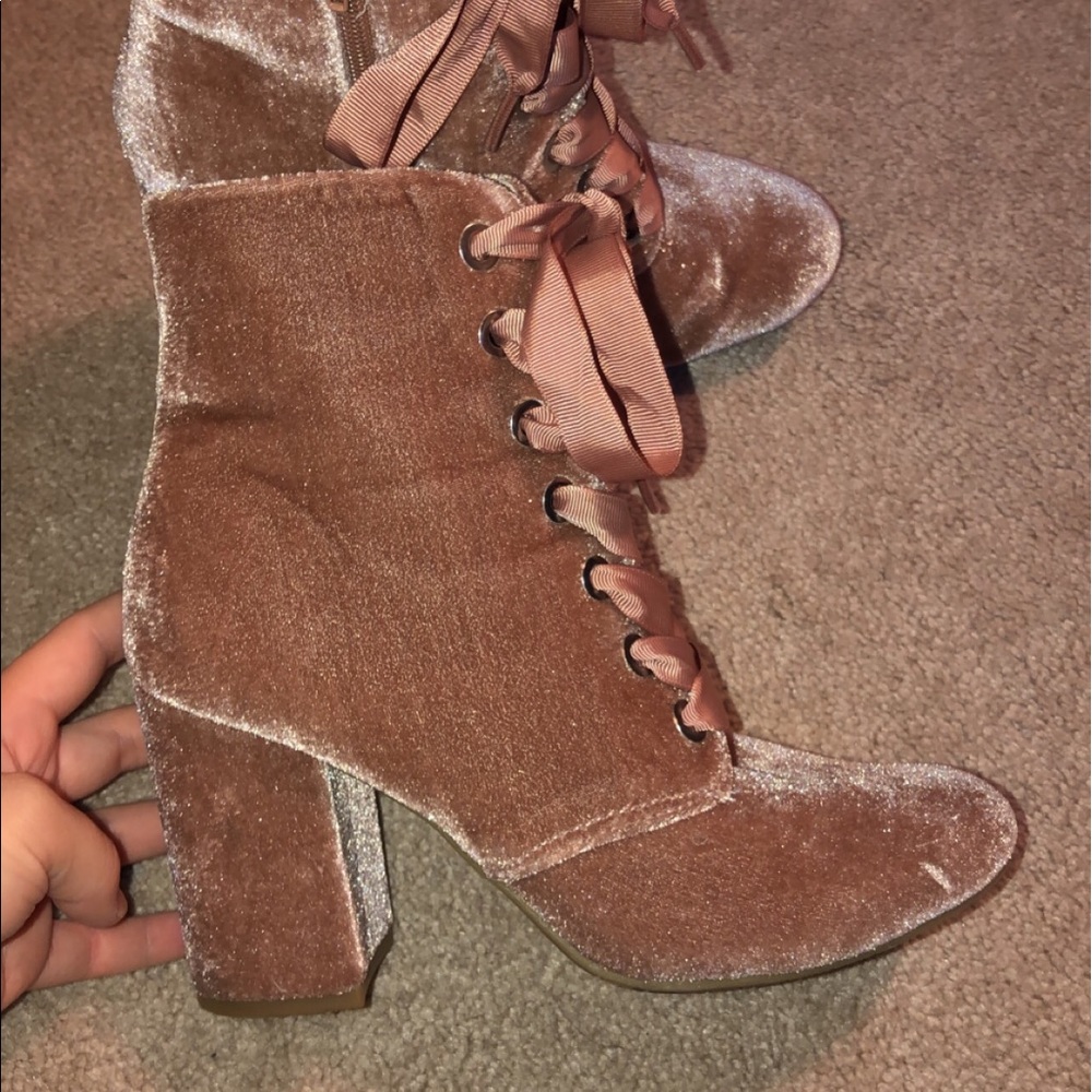 Pink fuzzy/ suede boots.